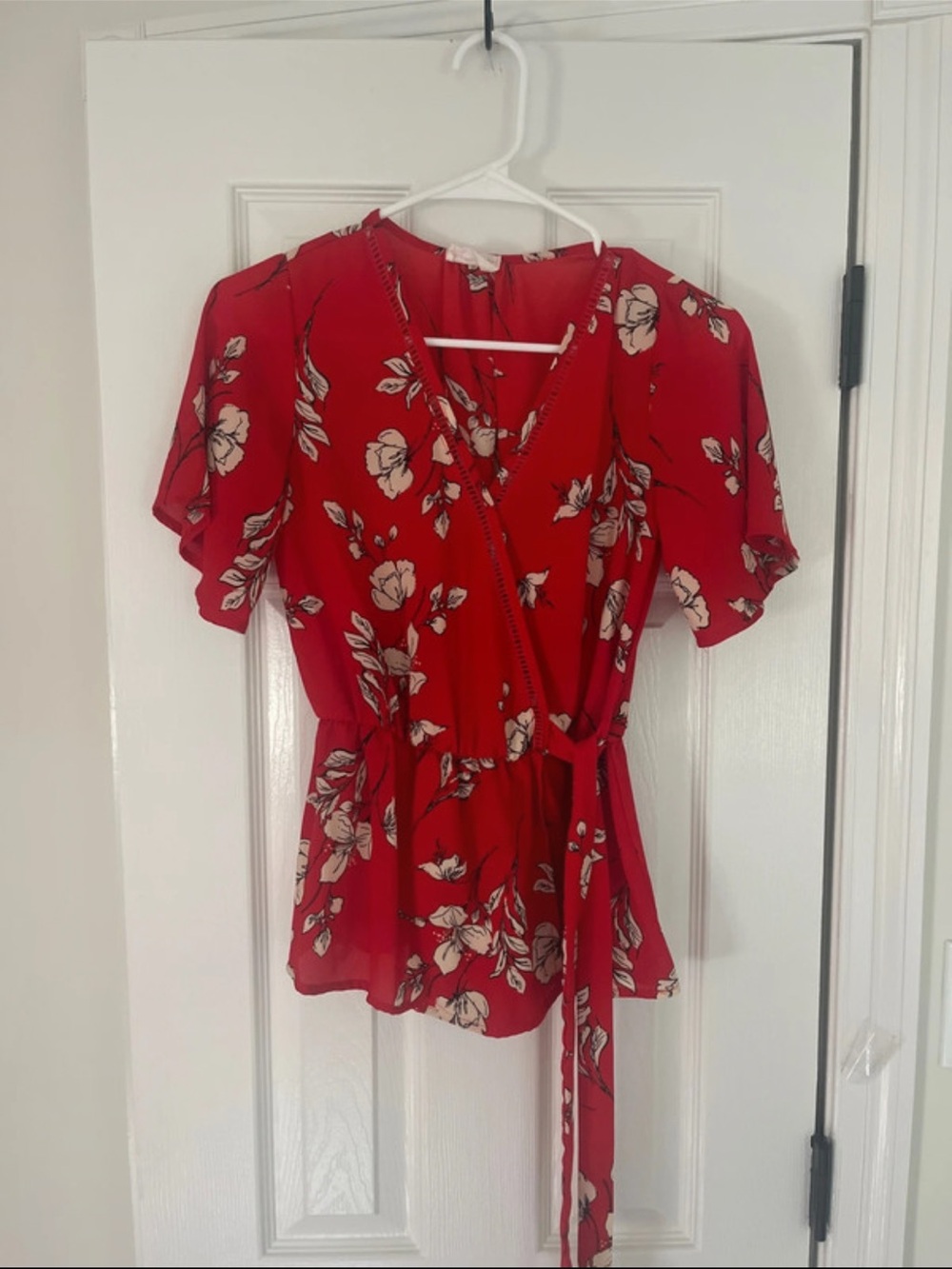 Sienna Sky Floral Wrap Peplum Blouse